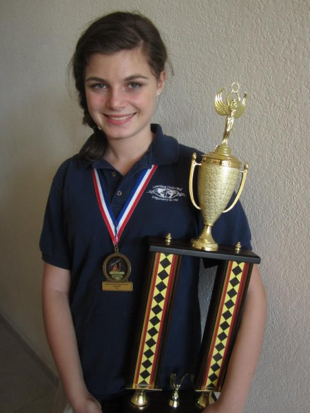 Andi sporting her trophy and medal