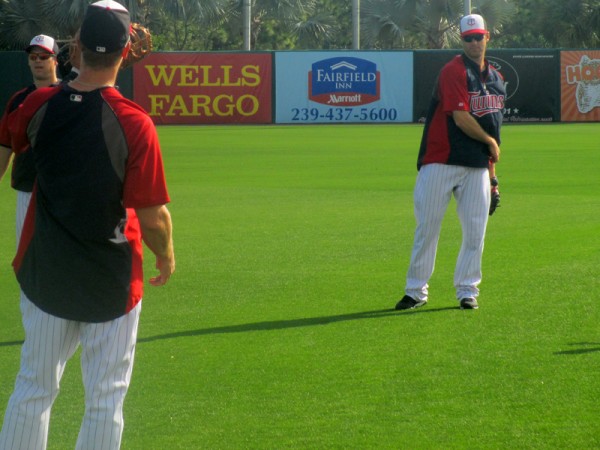 Justin and Joe playing catch during warmups.