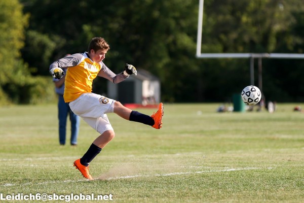 Tanner playing goalie for Central High school's soccer team